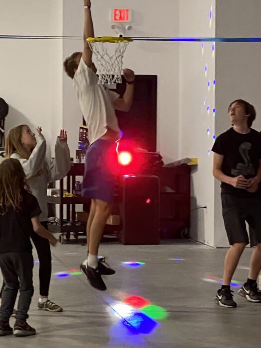 Shooting hoops under the disco lights