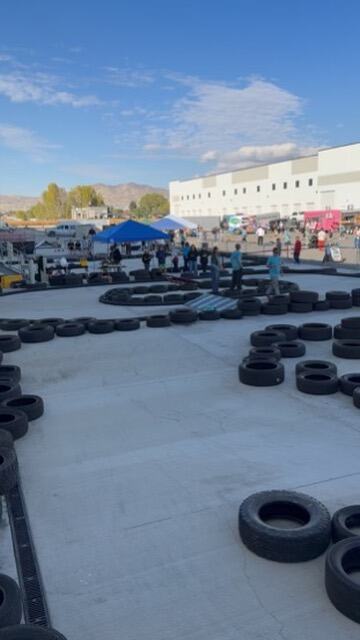 The tyre-lined crazy cart circuit at an outdoor event