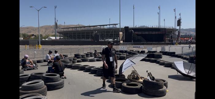 Crazy carts running a tyre circuit in a speedway paddock
