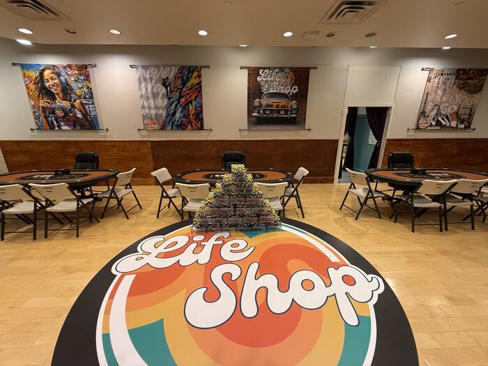 The Life Shop logo painted on the floor