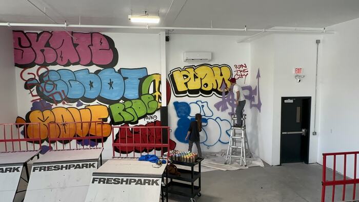 The finished SKATE SHOOT RIDE MOVE PLAY wall