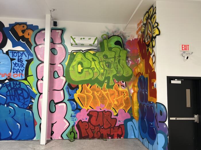 The values wall: WORK HARD, PLAY HARD, GO DO IT, KEEP ON KEEPING ON