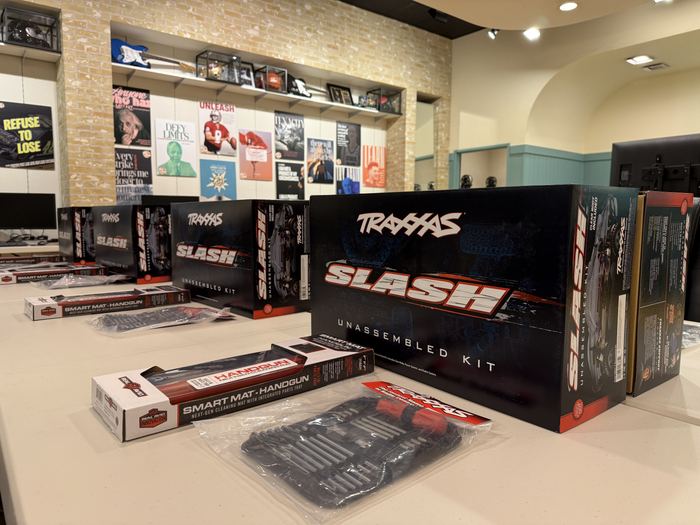 A Traxxas Slash kit box on the build table