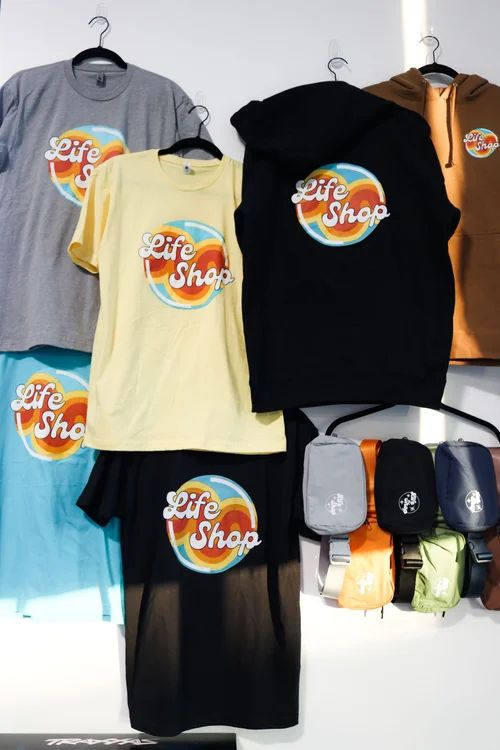 Life Shop belt bags and apparel on display
